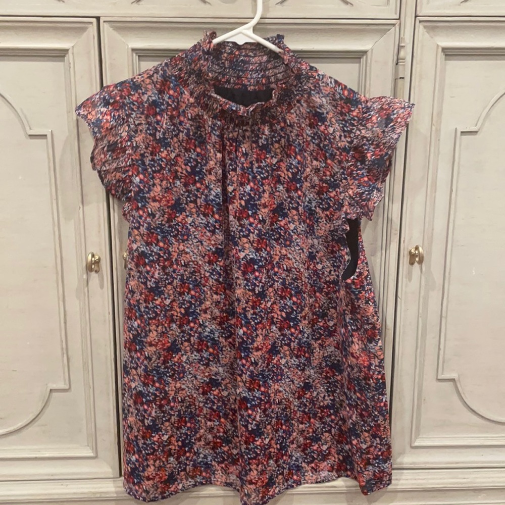 Banana Republic sleeveless blouse. Ruffle cap sleeve